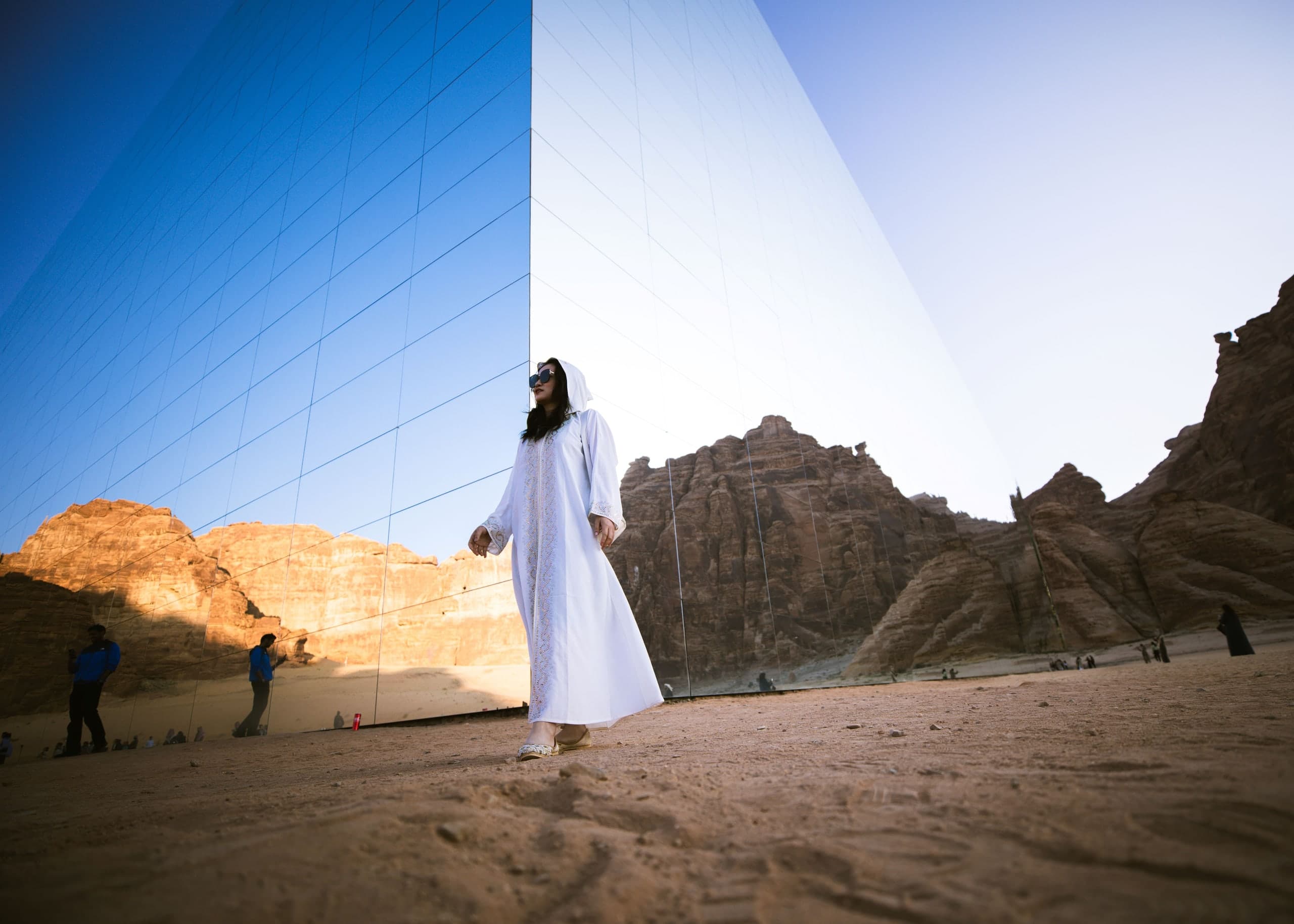 Students marveling at the sandstone formations of AlUla